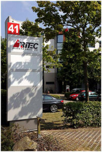 Tritec, Firmenschild